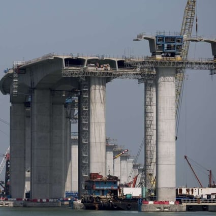 Construction work takes place on the Hong Kong Link Road, part of the Hong Kong-Zhuhai-Macau Bridge in Hong Kong on May 11 2016. Photo: EPA