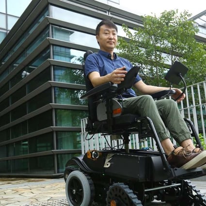 Alan Lee, inventor and director of B-Free Technology, with his stair-climbing wheelchair at Science Park. Photo: Edmond So