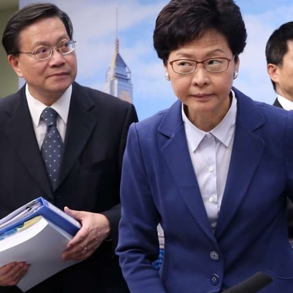 (From the left) Director of housing Stanley Ying, Secretary for Transport and Housing Anthony Cheung, Chief Secretary Carrie Lam and director of water supplies Enoch Lam attend a press conference on the commission of inquiry’s report. Photo: Sam Tsang