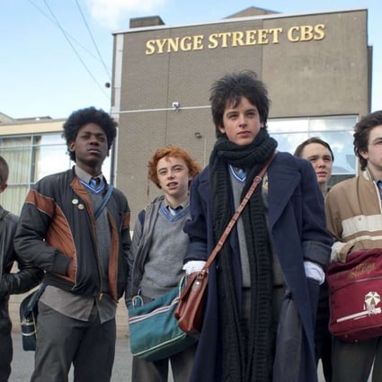 Ferdia Walsh-Peelo, front, plays Conor, a teenager who starts a band in 1980s Dublin, in Sing Street (category IIB), directed by John Carney.