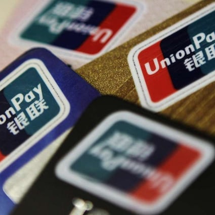 The UnionPay network processes some 55 trillion yuan of transactions a year from for some 5.4 billion cards in circulation. Photo: Reuters