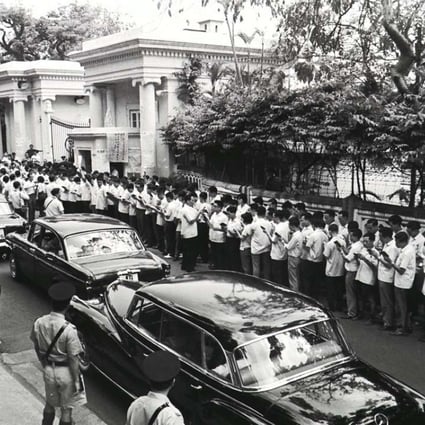 Scores of white-shirted leftists from the Hong Kong and Kowloon Committee for Anti-Hong Kong British Persecution Struggle recite quotations from Chairman Mao Zedong outside Government House. Photo: SCMP Pictures
