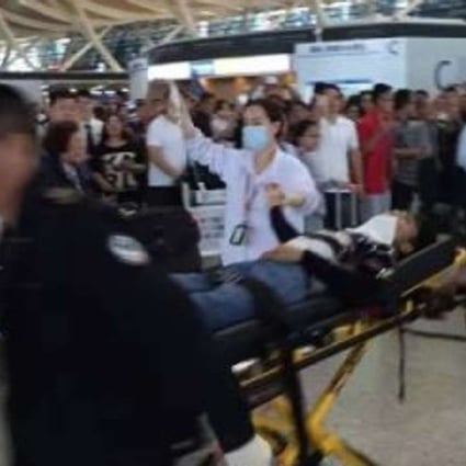 An online photo shows one of the four victims of the blast is rushed out of Passenger Terminal 2 at Shanghai Pudong Internationl Airport on Sunday afternoon. Photo: SCMP Pictures