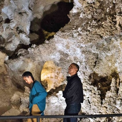 From left, Sasha Obama, US President Barack Obama, US first lady Michelle Obama and Malia Obama tour Carlsbad Caverns National Park in New Mexico. Photo: AFP