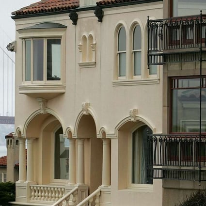 A row of luxury homes near the Golden Gate Bridge. There were a record 95 San Francisco houses on the market for at least $2.5 million at the end of April, up 42 per cent on the previous year. Photo: Justin Sullivan, Getty Images