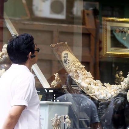 Ivory carvings and crafts on display in a store in Hollywood Road, Sheung Wan. Photo: Dickson Lee