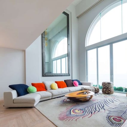 Luxurious and spacious living room with sea view at the Red Hill Peninsula’s Cedar Drive property, in Tai Tam.