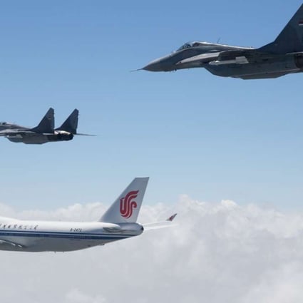 Serbian Air force MIG 29 fighter planes escorting China’s Presidential Boeing 747 with President Xi Jinping on board before landing at Belgrade airport on June 17, 2016 . Photo: AFP