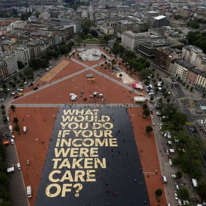 An 8,000-square-metre poster on display in Geneva, Switzerland, ahead of a vote on whether to adopt an unconditional basic income. Picture Reuters