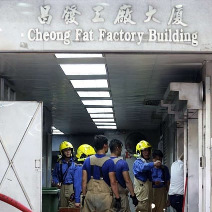 Firemen at the scene of the blaze in Kowloon. Photo: Felix Wong