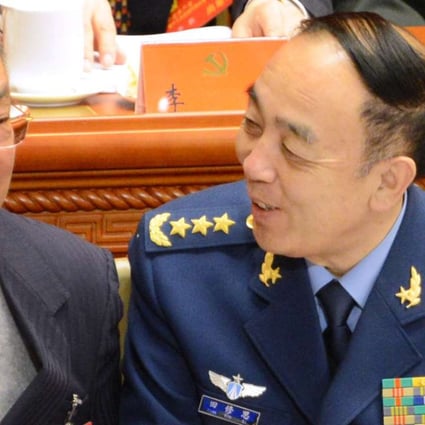 General Tian Xiusi(right) talks to Deng Pufang at the opening of the 18th Communist Party Congress at the Great Hall of the People in Beijing in 2012. Photo: AFP