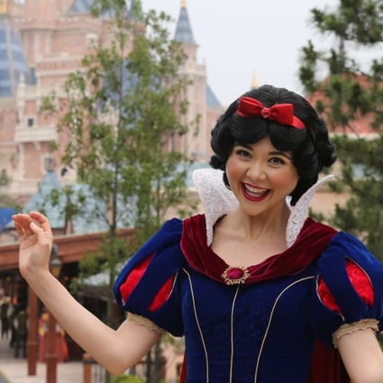 Snow White greets visitors on opening day at Shanghai Disneyland. Photo: Xinhua