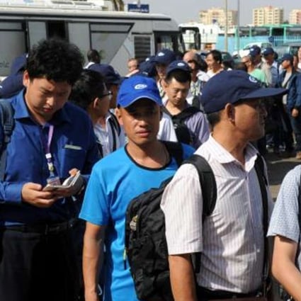 Chinese workers are evacuated from South Sudan’s capital, Juba, after the renewed fighting. Photo: SCMP Pictures