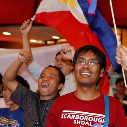 Activists from the Philippines celebrate after the UN ruling in favour of Philippines over the territorial dispute in the South China Sea. Photo: Reuters