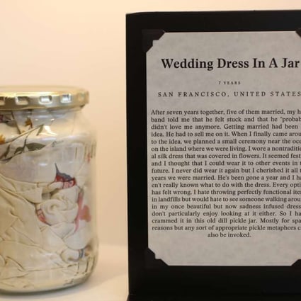 The Museum of Broken Relationships received this wedding dress stuffed into a pickle jar after a marriage went sour. Picture: Iris Schneider for The Washington Post.