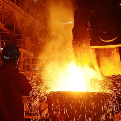 An employee works at a steel factory in Dalian, Liaoning province. Photo: Reuters