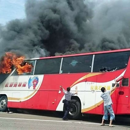 The fire broke out in the front of the tour bus after it crashed on the road leading to Taiwan Taoyuan International Airport on Tuesday. Photo: SCMP Pictures