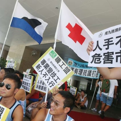 Lifeguards protesting for a better deal outside the headquarters of the Leisure and Cultural Services Department. Photo: David Wong
