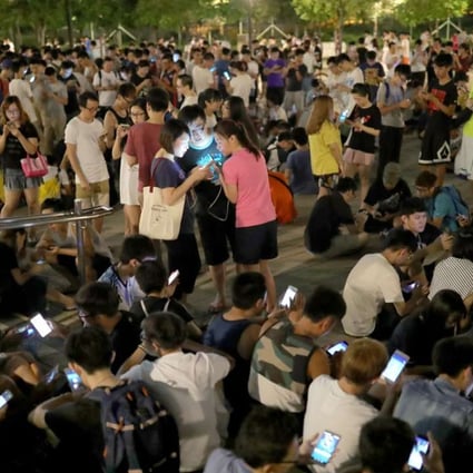 Tin Sau Road Park in Tin Shui Wai at night is a sea of Pokemon trainers.