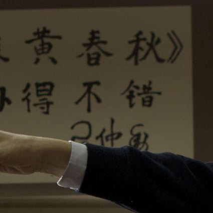 Du Daozheng in his Beijing office eight years ago, with Xi Zhongxun’s calligraphy praising the magazine in the background. Photo: SCMP Pictures