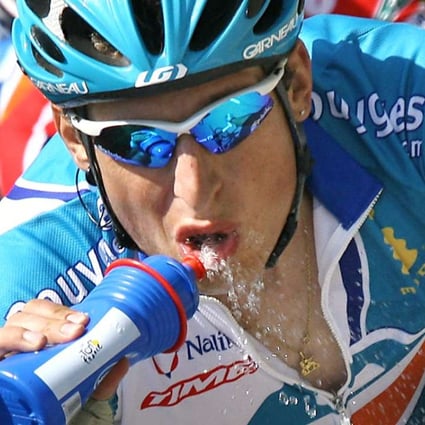 France's Pierrick Fédrigo keeps hydrated in this year’s 180.5 km 14th stage of the 93rd Tour de France. Photo: AFP