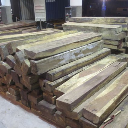 Hong Kong Customs seized about 73 tonnes of wood logs with a value of about HK$10 million from three containers on July 26 and 28. Photo: SCMP Pictures