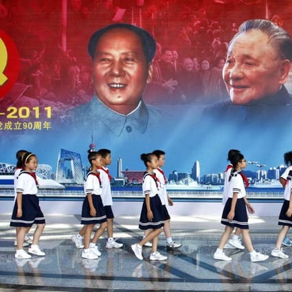 In this file photo from 2011, young pioneers of the Communist Youth League take part in a party celebration. Photo: AFP