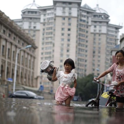 Submerged parts of Tianjin, during what was the city’s worst flooding in years. Damage in the Yangtze River basin and northeastern China left a US$33 billion economic toll on the country. Photo: EPA