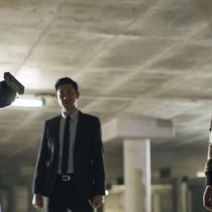 Nick Cheung (left) and Louis Koo (right) in Line Walker (category IIB (Cantonese), directed by Jazz Boon. The film also stars Charmaine Sheh and Francis Ng.