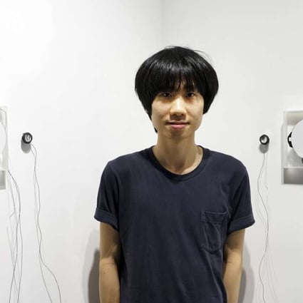 Lee Siu-hin with his installation |·o·||·o·||·o·||·o·||·o·||·o·|, at this year’s First Smash Art Project at Art Experience Gallery.