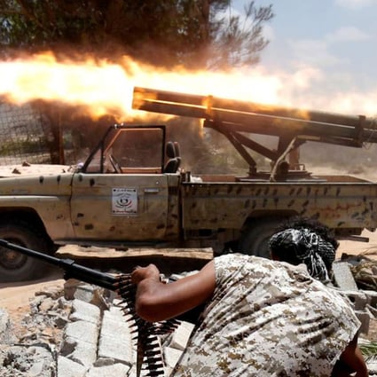 Libyan militants allied with the UN-backed government battle IS fighters in Sirte. Photo: Reuters