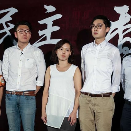 Disqualified Legco election candidates (from left) Nakade Hitsujiko, Edward Leung, Alice Lai, Chan Ho-tin and James Chan make a public announcement at Tamar Park in Admiralty. Photo: K. Y. Cheng