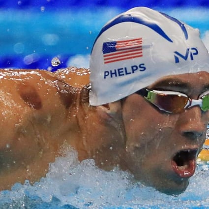Michael Phelps is seen with red cupping marks as he competes. Photo: Reuters
