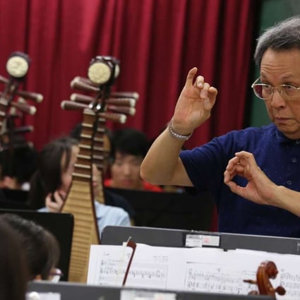 Gordon Siu Kwing-chue, founder of Music For Our Young Foundation (MOY), rehearses at Tin Shui Wai Methodist Primary School with its combined orchestra. Photo: Nora Tam