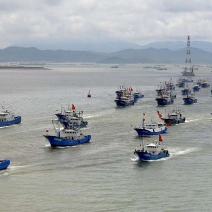 Fishing boats sail from Shenjiamen port in Zhejiang province to fish in the East China Sea. Photo: Xinhua