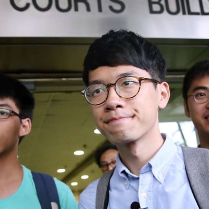 Joshua Wong Chi-fung, Nathan Law Kwun-chung and Alex Chow Yong-kang outside Eastern Court in Sai Wan Ho on Monday. Photo: Sam Tsang