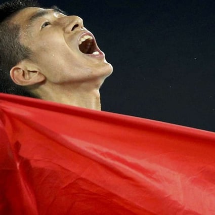 Zhao Shuai of China celebrates winning the men’s 58hk taekwondo final. Photo: Reuters