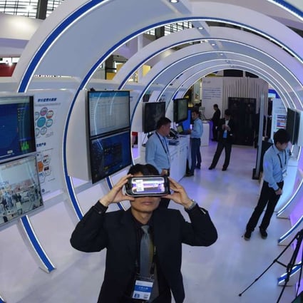 In this file photo, a visitor tries a virtual reality product during the Guiyang International Big Data Expo 2016. China is using big data to better track growth engines. Photo: Xinhua