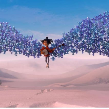 Kubo is swept up by origami wings in a still from Kubo and the Two Strings.