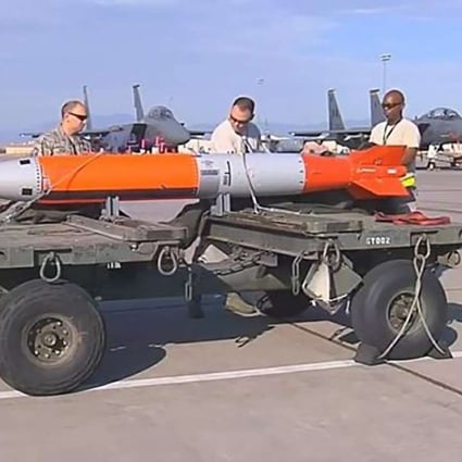 America’s B61-12 smart nuclear bomb being handled by weapons experts. Photo: SCMP Pictures