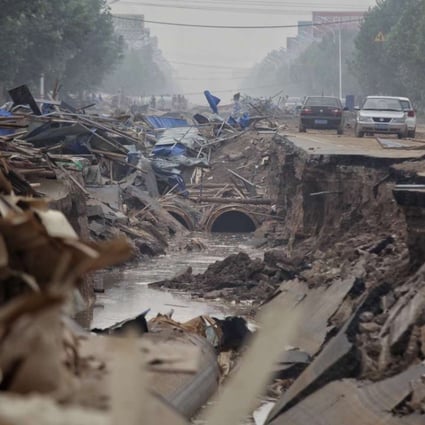 A damaged road in Xingtai following the flooding in July. Photo: Reuters