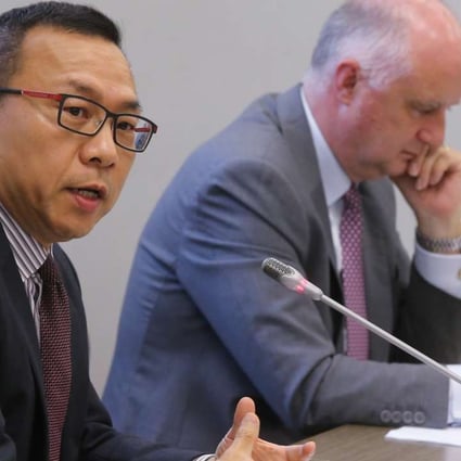 Brian Ho (left), executive director of the SFC’s Corporate Finance Division, and David Graham, chief regulatory officer and head of listing at HKEX, answer media queries regarding the joint consultation on listing regulatory structure on June 17. Photo: Dickson Lee