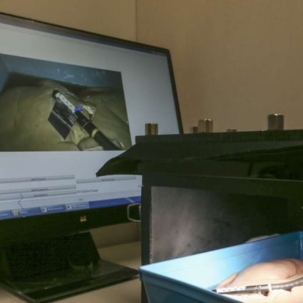 A computer screen shows combined real-time images from diagnostic probes during minimally invasive surgery. The technology was spearheaded by Catherine Chan. Photos: K.Y. Cheng