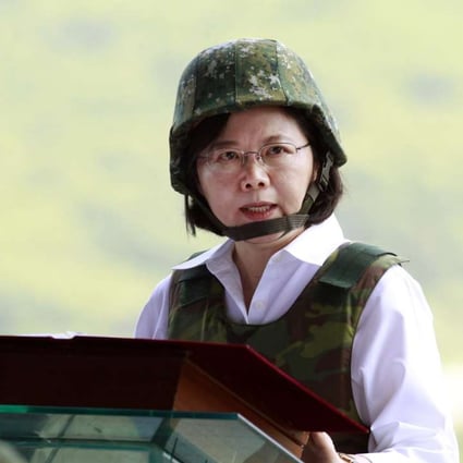 President Tsai Ing-wen, wearing a camouflage helmet and bulletproof vest, delivers a speech during the annual Han Kuang military exercises. Photo: AP
