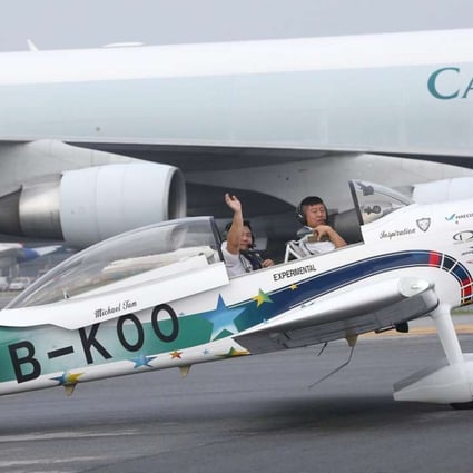 Hank Cheng and Gary Tat prepare for take off at Hong Kong International Airport. Photo: SCMP Pictures