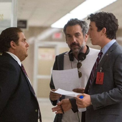 Director Todd Phillips (middle) with actors Jonah Hill (left) and Miles Teller on the set of War Dogs.