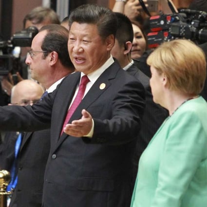 President Xi Jinping and German Chancellor Angela Merkel, French President Francois Hollande, and Russia President Vladimir Putin walk into the main G20 hall in Hangzhou on Sunday. Photo: Simon Song