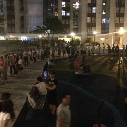 The queue outside a polling station in Taikoo Shing actually doubled in size after 10pm Sunday. Photo: Owen Fung