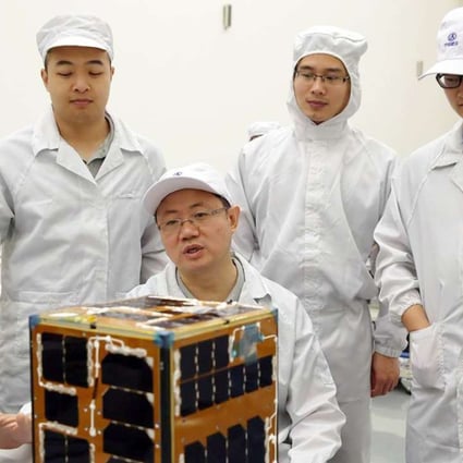 Researchers at Northwestern Polytechnical University and their “cubesat”, which was launched at the Hainan Satellite Launch Centre in June. Photo: Nwpu.edu.cn