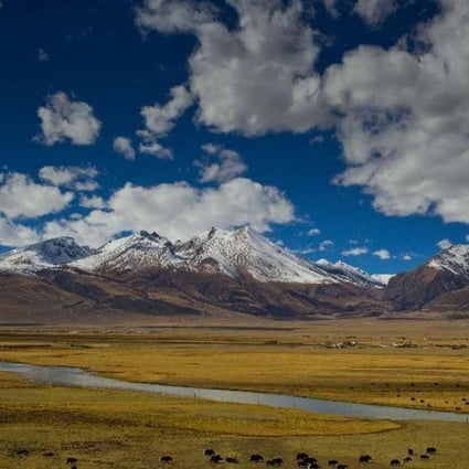 A file picture of clouds above mountains in Tibet. Photo: Xinhua